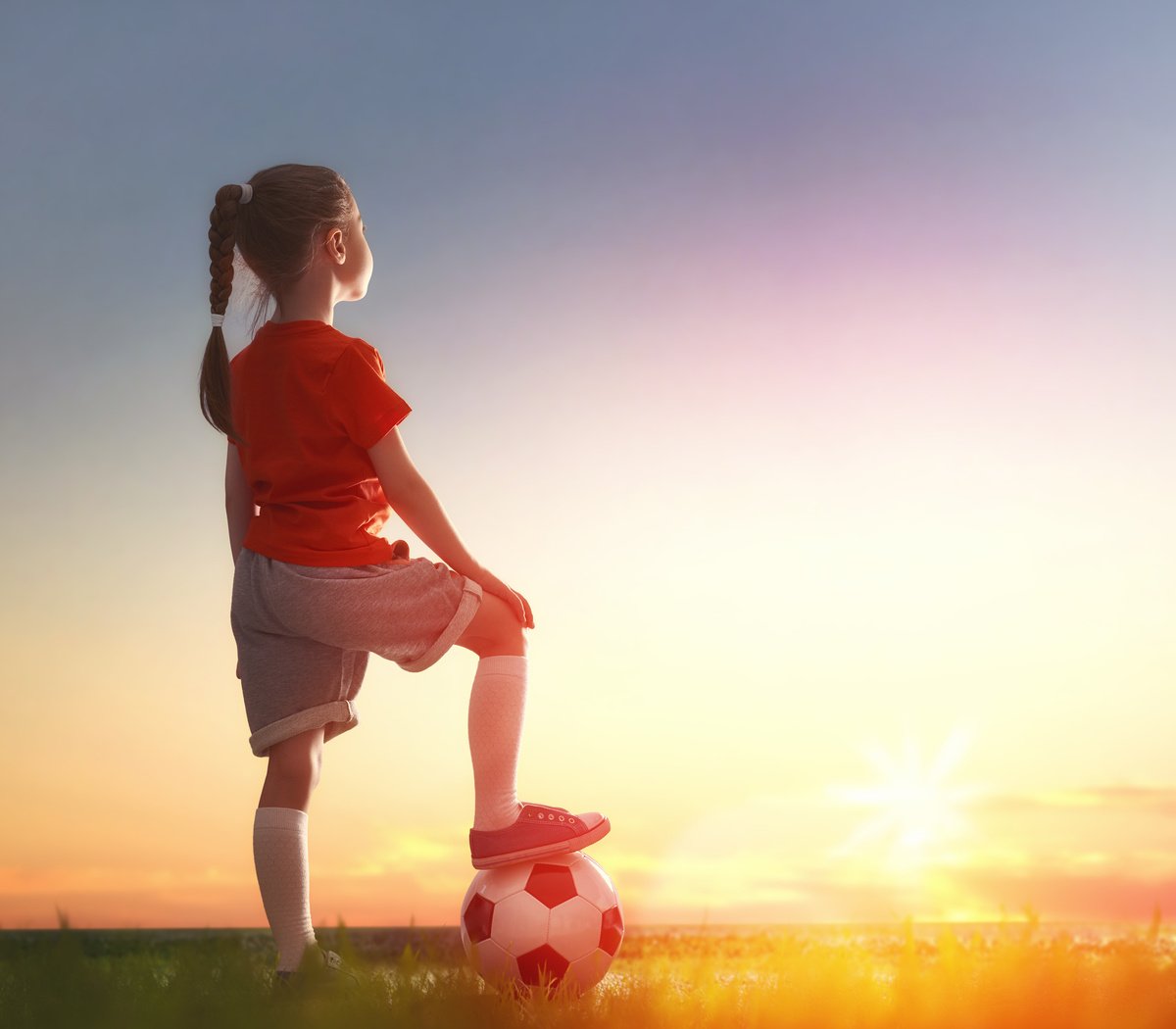 Child plays football